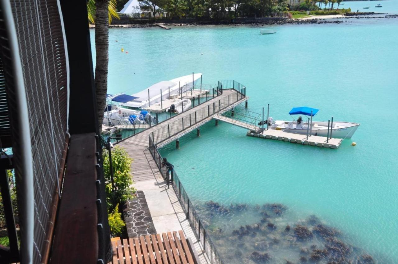 Sunset Boulevard, Grand Bay Buitenkant foto